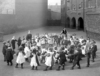 Organised dancing in playground, Flint Street School, Southwark, 1908. From the London Metropolitan Archives Photograph Library. Ref SC/PHL/02/ 0205. Copyright City of London: London Metropolitan Archives. Not to be reused without permission.